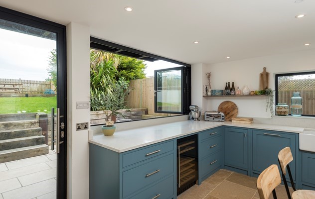 Spacious Holiday Home captures a beautiful view of the sea through Origin Sliding Doors